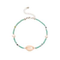 COWRIE SHELL & EVIL EYE ANKLET