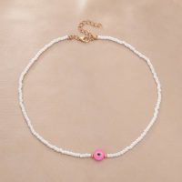 SEED BEAD CHOKER W/ FIMO EVIL EYE