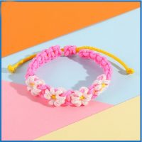 PINK NYLON WHITE FLOWERS BRACELET