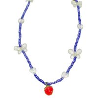 PURPLE SEED BEAD NECKLACE W/ STRAWBERRY
