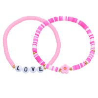 SET OF 2 PINK HEISHI BRACELETS W/ FLOWER