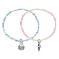 SET OF 2 PASTEL CORAL TONE BRACELETS W/ SHELLS