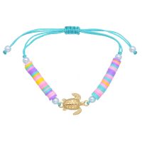 PINK CORAL TONE HEISHI BRACELET W/ PEARLS & GOLD TURTLE