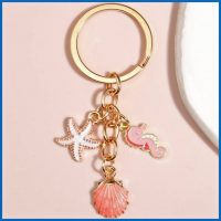 PINK SEAHORSE, SEASHELL AND STARFISH KEYRING