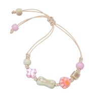 PINK ANIMAL PAW & FLOWER BRACELET