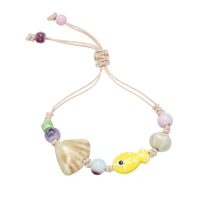 YELLOW FISH & SHELL BRACELET
