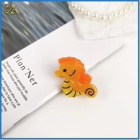 ORANGE SEAHORSE  HAIRCLIP