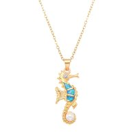 P8230 BLUE SYNTHETIC OPAL GOLD SEAHORSE W/PEARL PENDANT