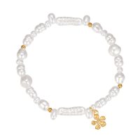 BR8473 PEARL ELASTIC BRACELET WITH GOLD FLOWER