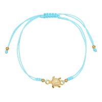 BR8520 SPARKLY GOLD TURTLE ON BABY BLUE ROPE BRACELET