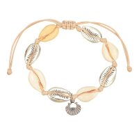 BR8521 COWRIE & RHODIUM COWRIE SHELL BRACELET